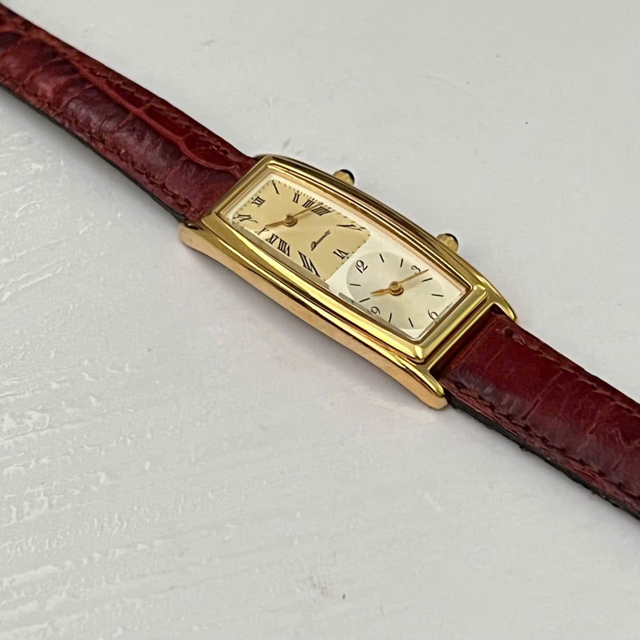 Đồng hồ nữ nhật vintage 2 mặt số dáng tank dây da độ mới cao