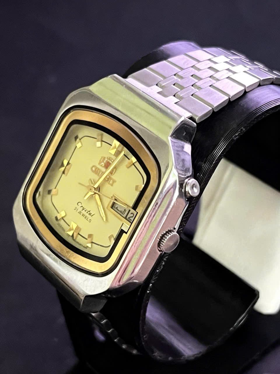 Đồng hồ Orient Crystal 21 Jewels Day-Date, thập niên 1970s-1980s