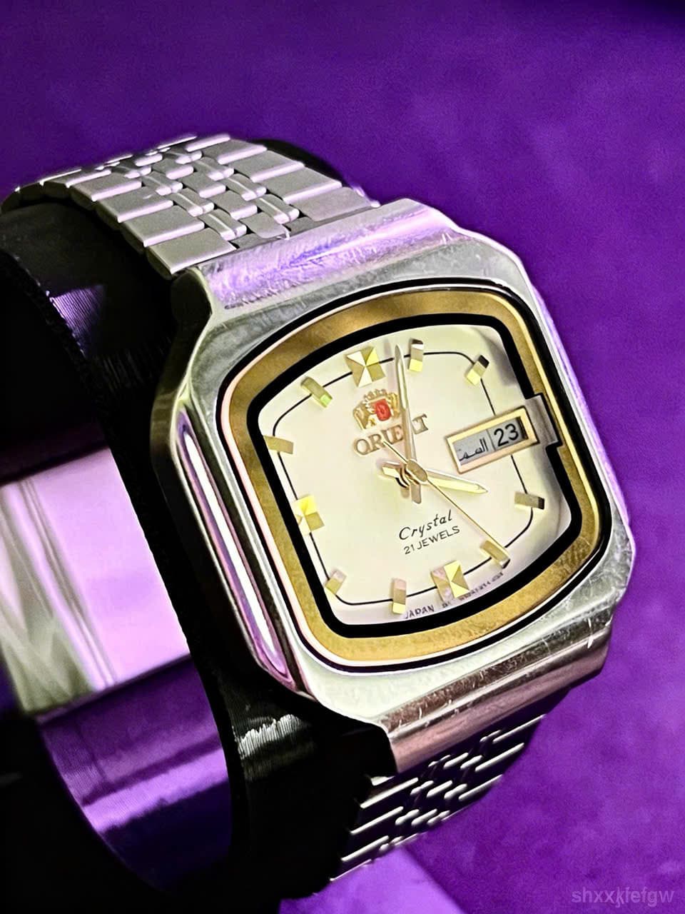 Đồng hồ Orient Crystal 21 Jewels Day-Date, thập niên 1970s-1980s