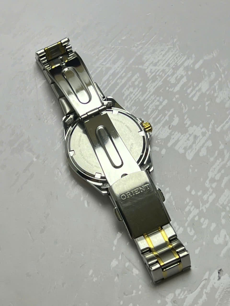 Đồng hồ Orient chính hãng nhật máy pin mặt trắng, đồng hồ 2hand mới 99% chống nước 10bar