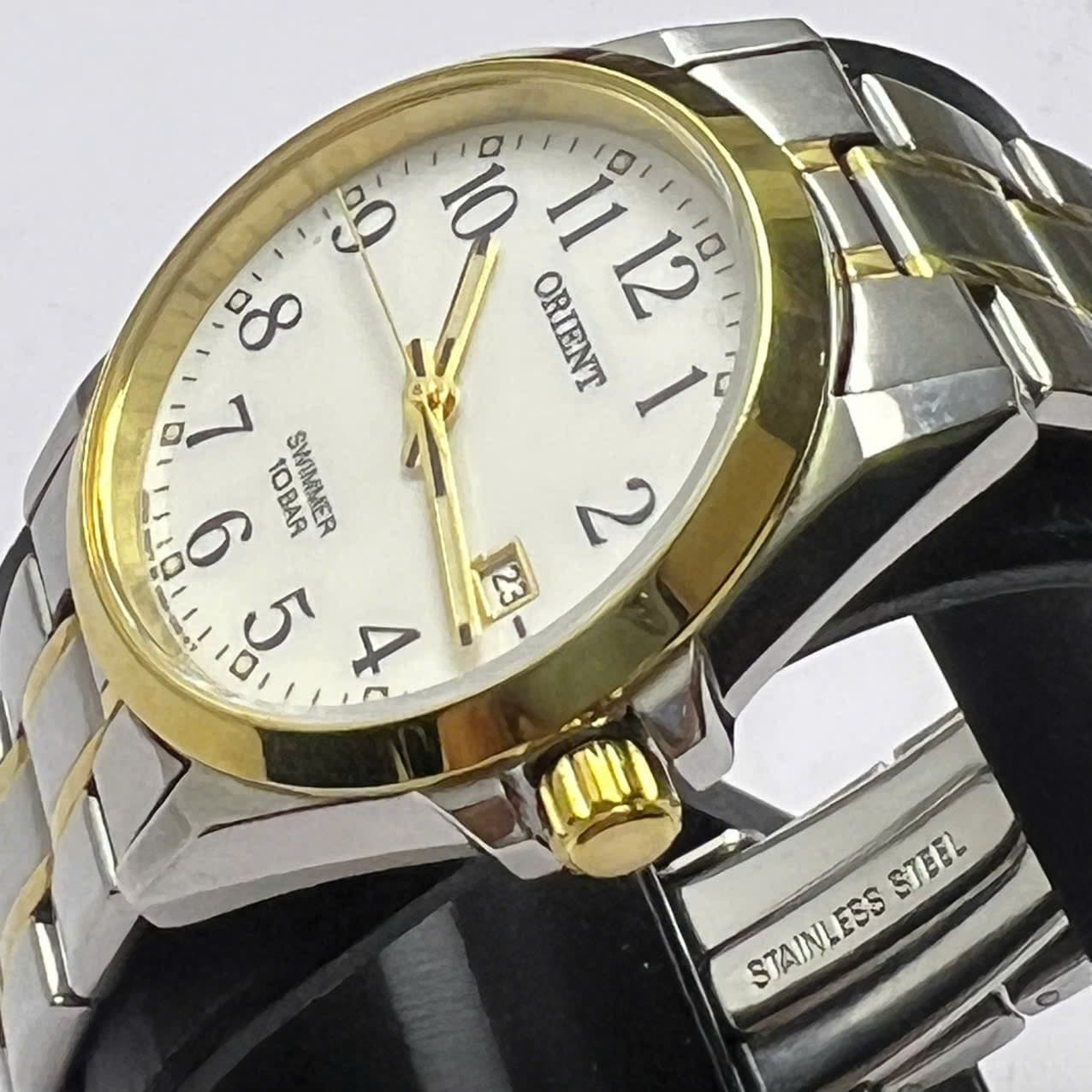Đồng hồ Orient chính hãng nhật máy pin mặt trắng, đồng hồ 2hand mới 99% chống nước 10bar