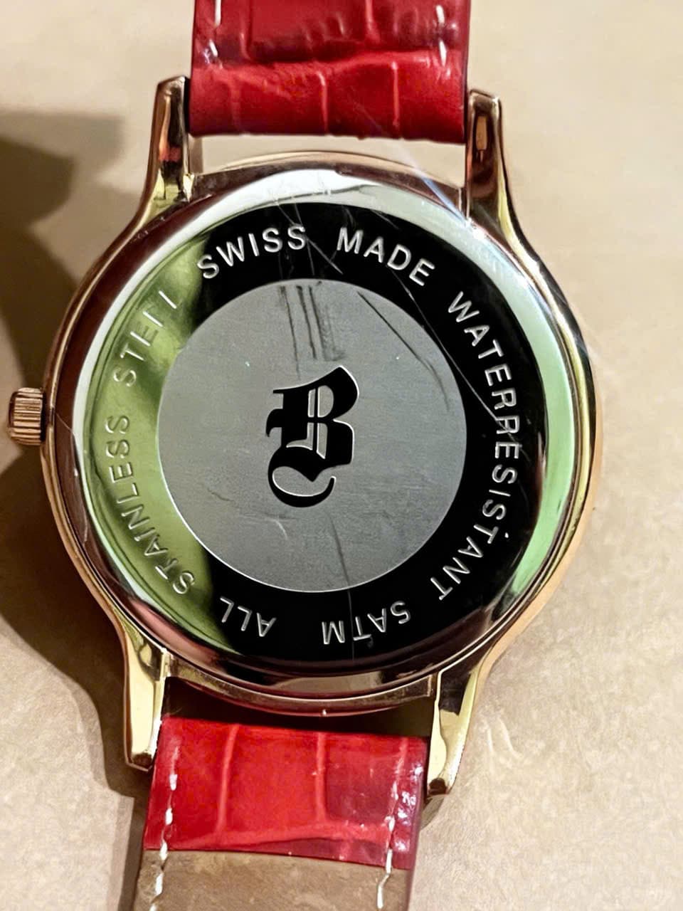 Đồng hồ nữ B Watch Thụy Sĩ, dây đỏ thêu hoa