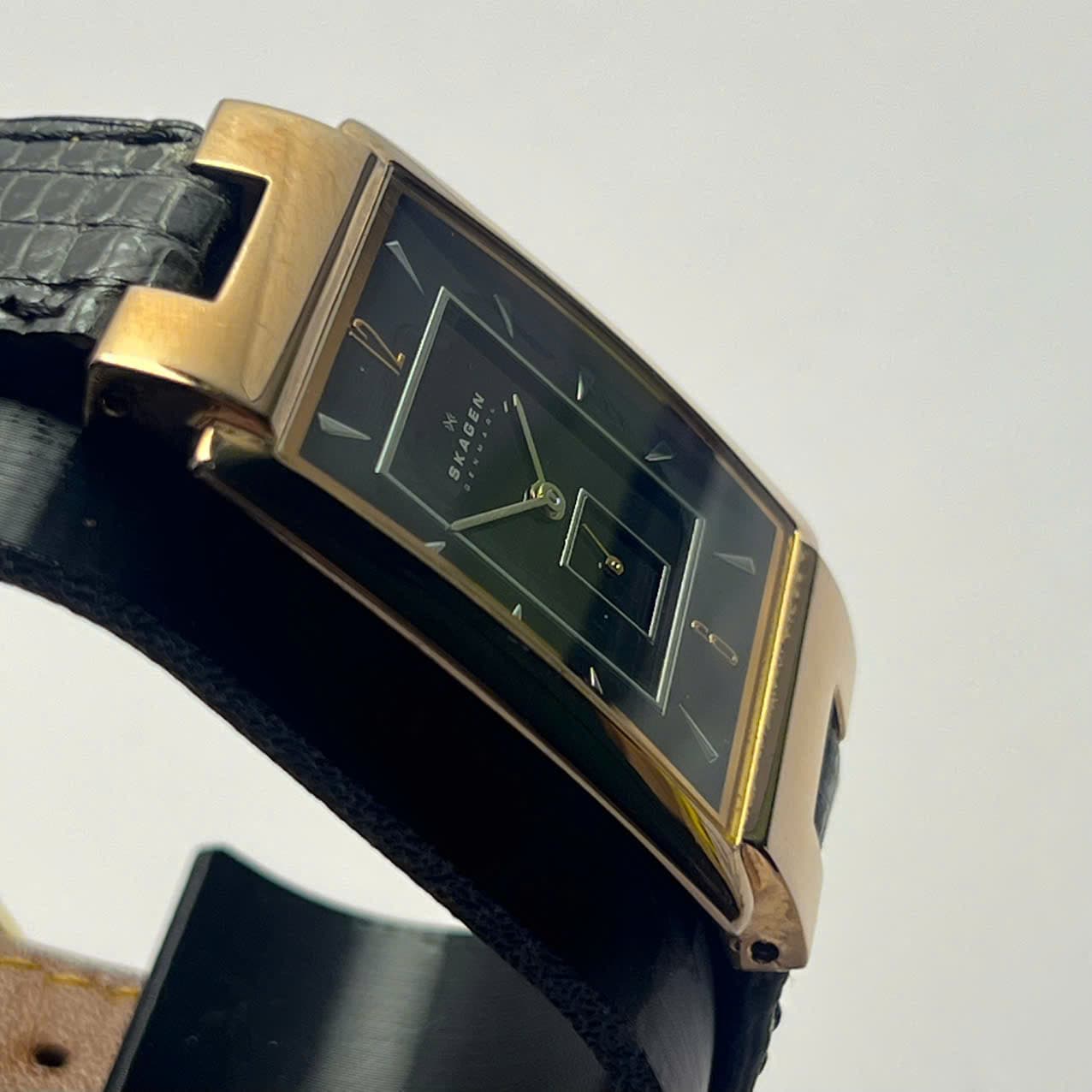 Đồng hồ Skagen Denmark mặt chữ nhật đen rose gold – dây da quartz tối giản